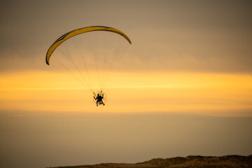 paragliding in the sunset