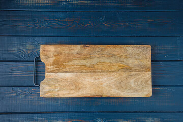 board for cutting food and cooking on the background.