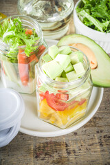 Healthy vegetable salad in jars