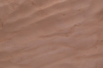 Soil wall texture of clay house structure.mud background, soft picture