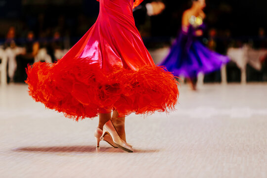 Female Dancer In Red Ball Gown For Dance Competition