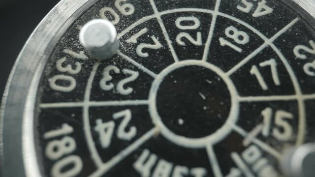 Closer look of the parts of the vintage camera found on the top of it