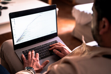 unrecognizable man working at home