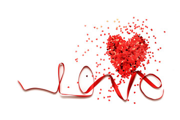 word love made of red ribbon and heart made of sequins. valentine day card
