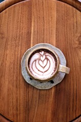 A close up of a cup of latte