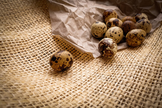 Quail eggs are on the sacking. Easter day. Easter eggs. 