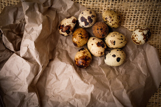 Quail eggs are on the sacking. Easter day. Easter eggs. 