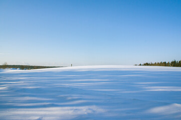 Empty clean winter landscape on a sunny day