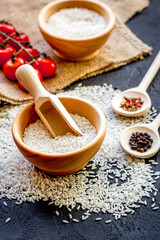 ingredients for paella on dark background