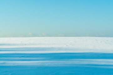 Empty clean winter landscape on a sunny day