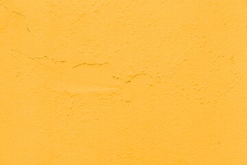 Old Yellow cement wall peeling paint texture and background seamless