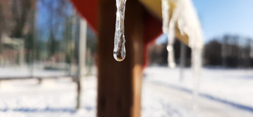 icicles hanging from a roof