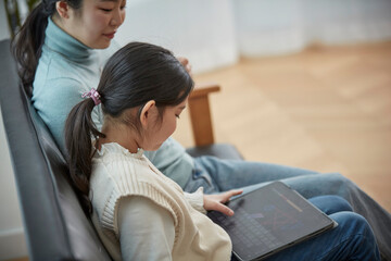 couple using digital tablet