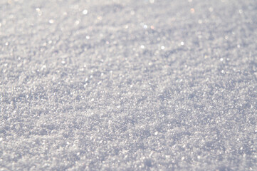 Light texture of winter snow close up