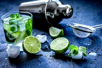 mojito in glass on dark background close up