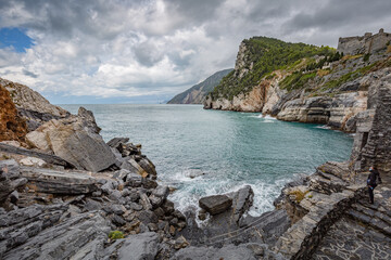 Fototapeta na wymiar Cliff sea coast with Grotta di Lord Byron in Portovenere or Porto Venere town on Ligurian coast. Province of La Spezia. Italy