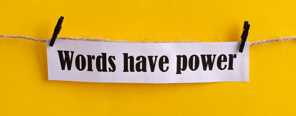 Quote WORDS HAVE POWER on bright yellow background. Motivational Words Quotes Concept