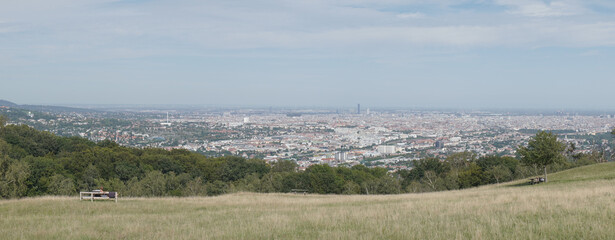 ArchitViews from Wiener Blick viewpoint up in the hilly forested mountains of Vienna City in Austria.ecture of Vienna City in Austria.