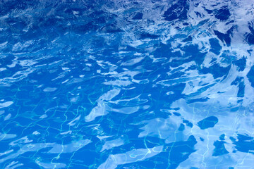water in swimming pool rippled water