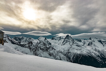 Beautiful rocky mountains in winter. Winter mountain resort in Dombay.