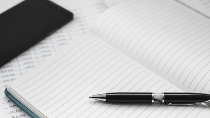 Phone, Black pen on notebook