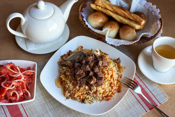 the national Uzbek dish is pilaf with meat