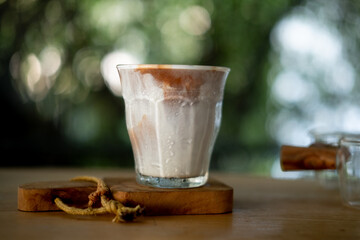 Dirty coffee menu, that is  between iced milk at the bottom of the glass and shot espresso top