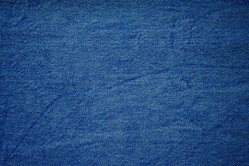Fototapeta na wymiar Denim blue jeans fabric. Denim background texture for design. Canvas denim. Blue jeans texture for any background.