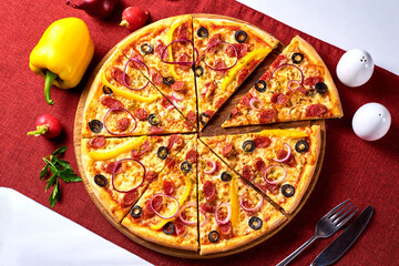 pizza with olives, sausage, onion, pepper