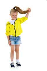 Cute stylish girl holding her ponytail