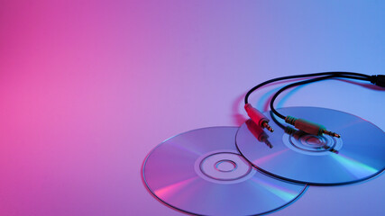 plug and CD drive . red and blue illumination, cyberpunk.