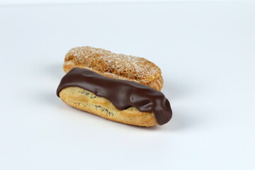 eclairs with chocolate and nuts