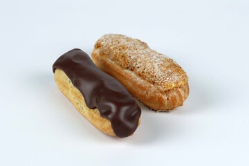 eclairs with chocolate and nuts