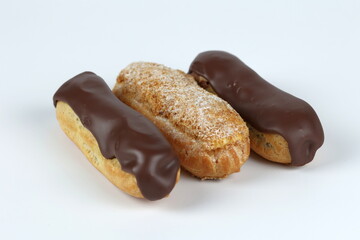 eclairs with chocolate and nuts