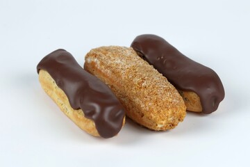 eclairs with chocolate and nuts