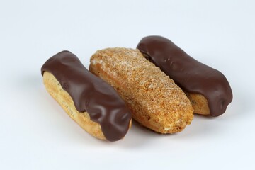 eclairs with chocolate and nuts