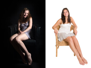 Two gorgeous young women wearing casual summer clothes, they are are laughing and sitting in front...