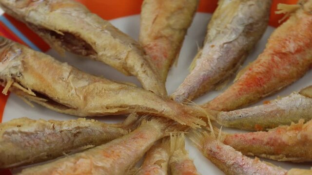 fresh fish small mullets cleaned and fried