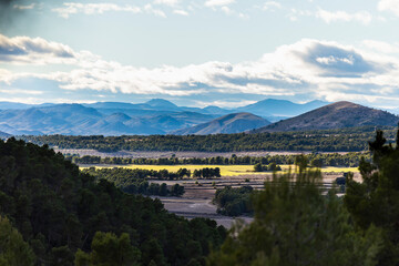 landscape of green fields and mountains