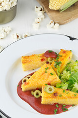 Polenta fried with parmesan and olives series picture 09