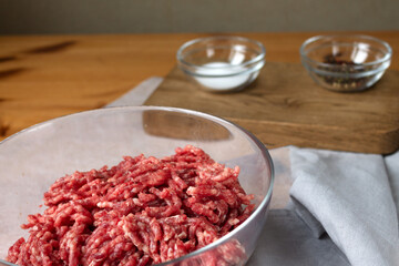 Ground beef meat from fresh meat salt and pepper for cooking cutlets.