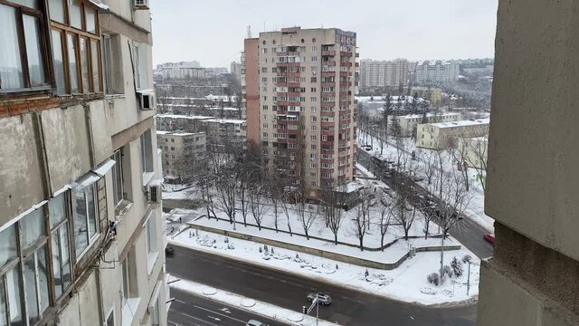 Aerial view on the traffic from the top of multistorey block of flats building in Chisinau, Moldova