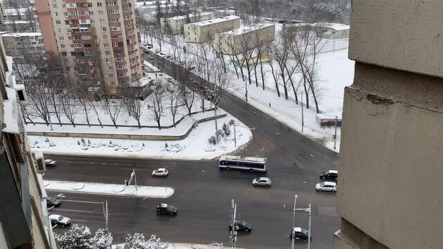 Aerial view on the traffic from the top of multistorey block of flats building in Chisinau, Moldova