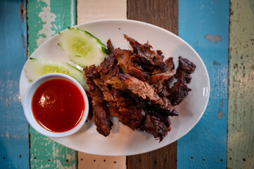 Medium roast beef with Thai style dipping sauce