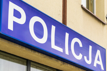 signboard with the word police on the building