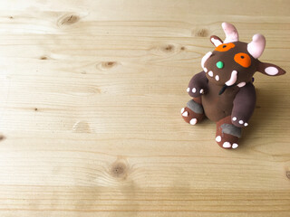 the monster from the book of gruffalo made by hand from clay. Advertising of children creativity