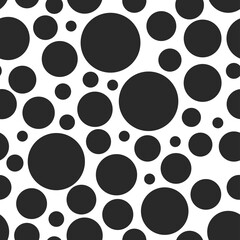 Circles seamless pattern. Black circles on a white background. Trendy geometric design.