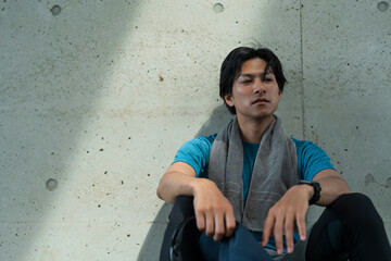 運動中に体調を崩した男性