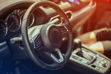 Close-up look of luxury car interiorin detail of a modern car. Dashboard of a modern car 