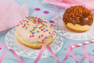 'Berliner Pfannkuchen', a traditional German dessert similar to doughnut with no hole, made from sweet yeast dough fried in fat glazed with chocolate and sprinkles